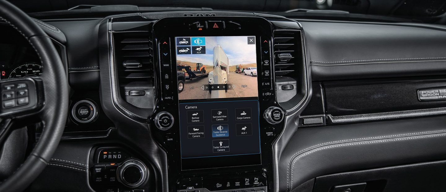 The touchscreen in the 2022 Ram 2500 with a split screen showing both the trailer top view and rear view.