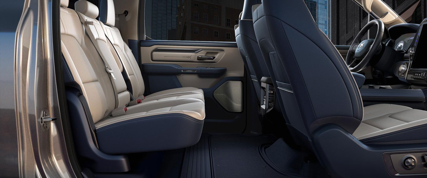 A view through the open rear door of the rear passenger seats on the 2020 Ram 1500.