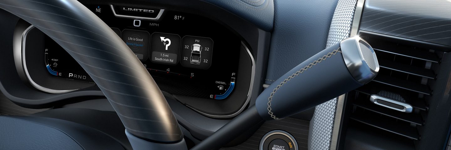 A partial view of the Driver Information Digital Cluster in the 2023 Ram 2500 Limited displaying the tire pressure, speed and directions.
