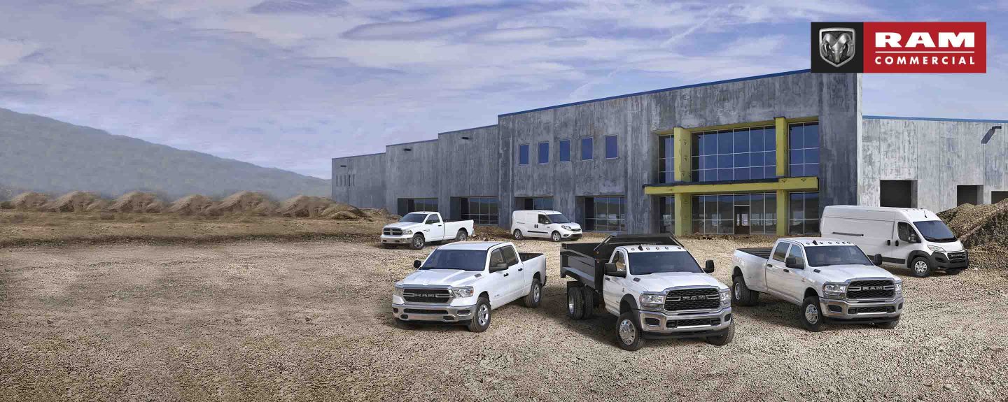 A lineup of six Ram trucks and vans on a construction site. Ram Commercial Truck Season.