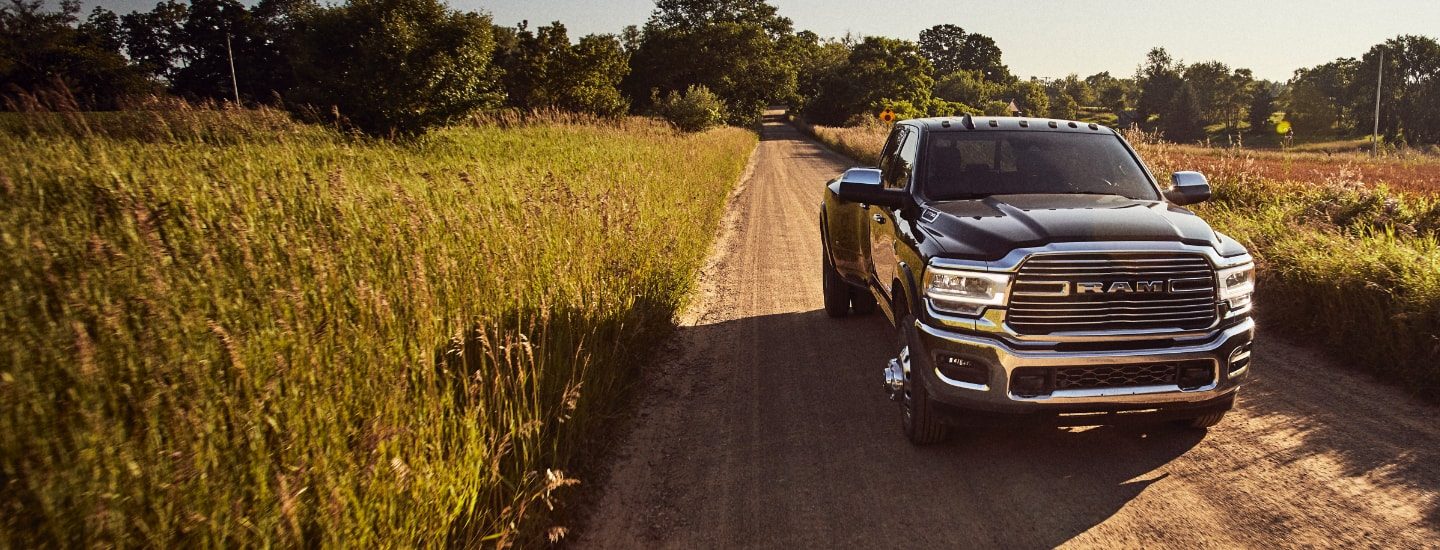 A Ram 2500 parked in a field
