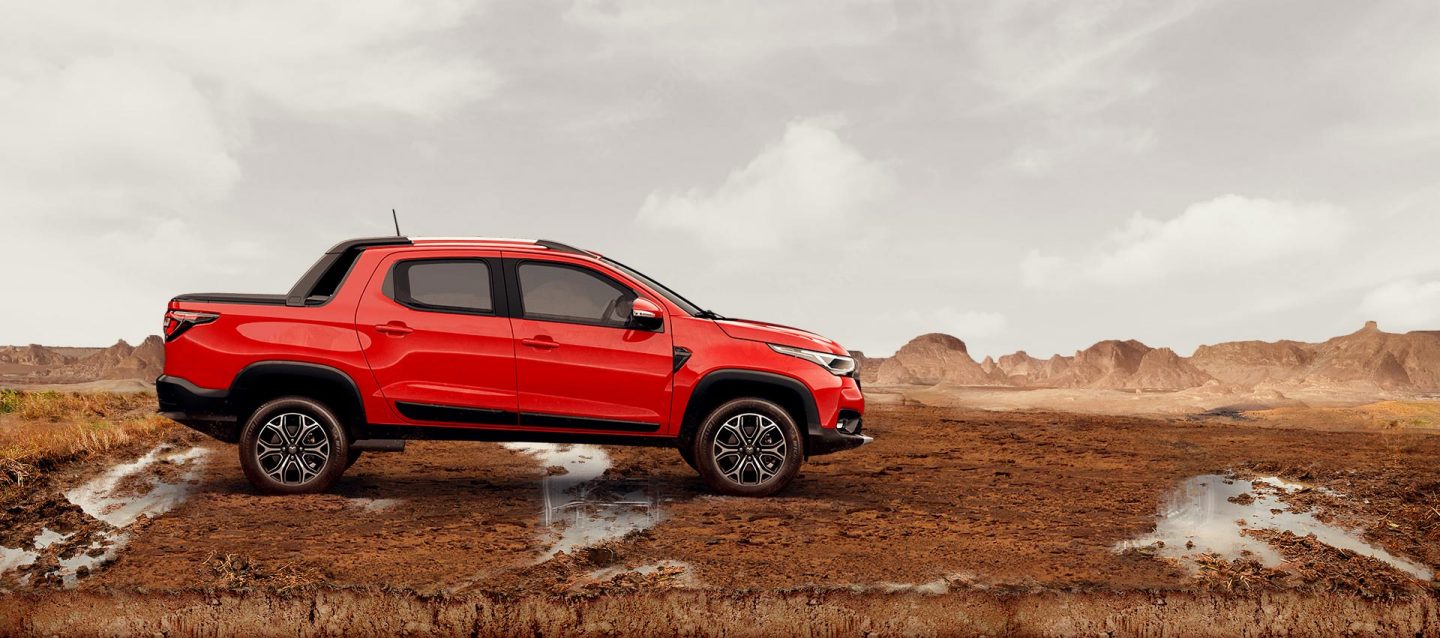 Pickup Ram 700 2026 rojo, vista lateral