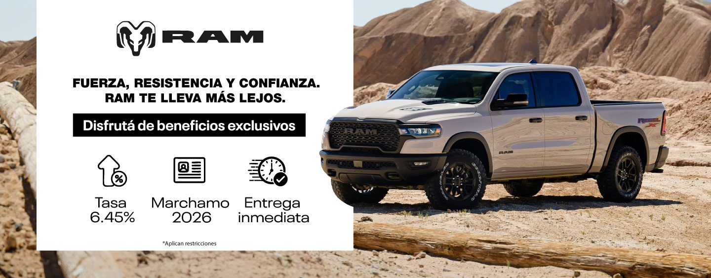 A black 2025 Ram 1500 Laramie 4x4 Crew Cab parked on a clearing in the desert at dusk. It's Ram season.